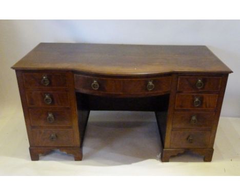 A Late 19th Early 20th Century Mahogany and Inlaid Semi-Bow Fronted Twin Pedestal Desk, with nine drawers and half circular h