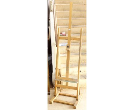 A beech artist's floor standing folding easel 