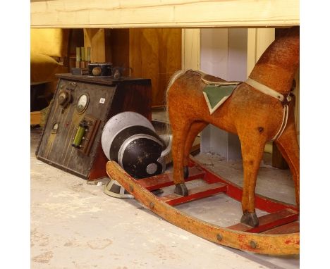 A collection of stage props, to include helmet, rocking horse etc 