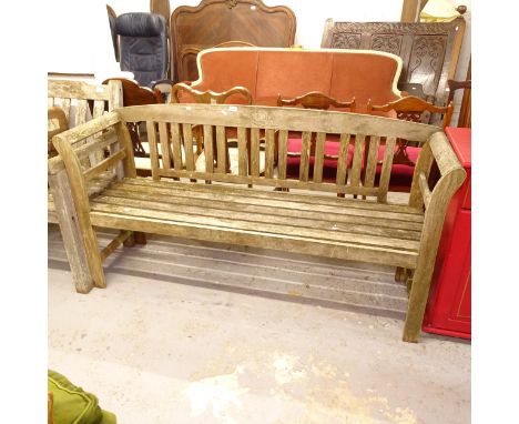A weathered teak garden bench, L157cm 