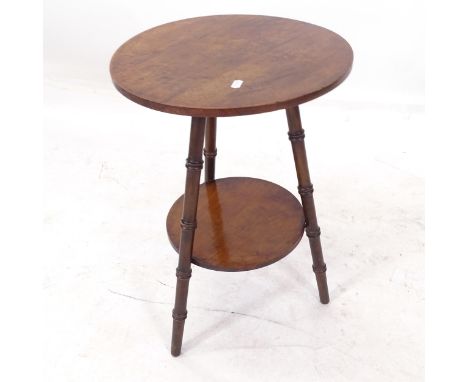 A 19th century mahogany circular 2-tier lamp table, on turned tripod legs, W37cm, H55cm 