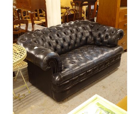 A blue leather allover button-upholstered rollover arm Chesterfield settee, L170cm, H70cm, seat height 40cm and depth 54cm 