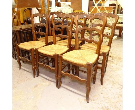 A set of 6 French oak ladder-back dining chairs 