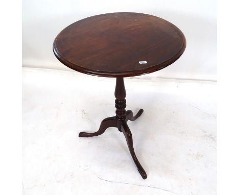 An Antique mahogany lamp table, on turned centre column and tripod base, W52cm, H75cm 