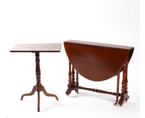 A Victorian walnut Sutherland table with oval two-flap top, 87cm wide and a Victorian tripod table, 55.5cm diameter