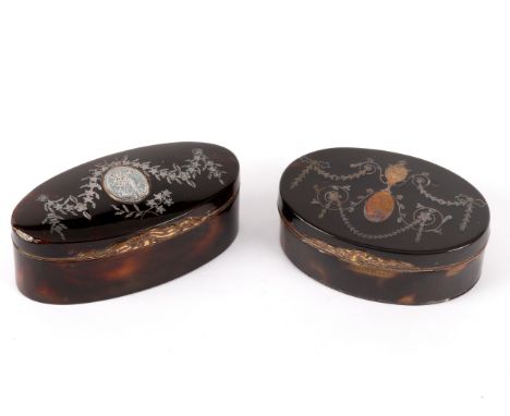 A Georgian tortoiseshell oval snuff box inlaid a gilded urn with surround of swags, 7cm wide and another inlaid an oval and g