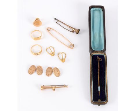 A quantity of gold stick pins, rings etc.