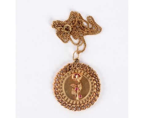 A 14k gold pendant centred by a gem set flower to a flattened curb link border, approximately 12.5gm on a yellow gold neck ch