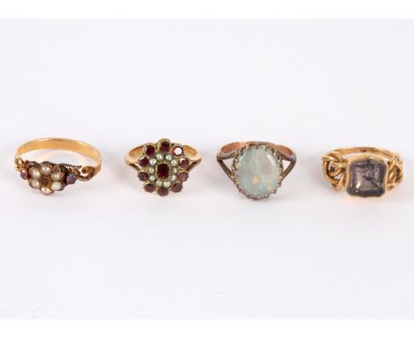 Two late Victorian gem set dress rings, an opal ring and another ring CONDITION REPORT: The opal ring - I ½Shield shape ring 