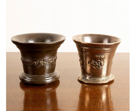 A small 17th Century English bronze mortar with shell and scroll detail, 13.5cm diameter, 11cm high, together with a small Du