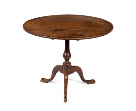 An oak table on turned column and tripod support, 85.5cm wide