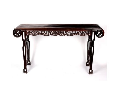 A Chinese altar table, the top with inlaid line, scroll ends and pierced frieze on end supports, 176cm wide CONDITION REPORT: