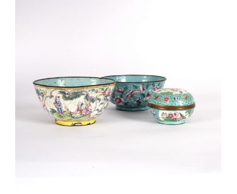 A Cantonese enamel bowl, depicting figures in reserves to a white ground embellished with flowering branches, 12cm diameter, 