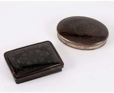 A Georgian rectangular tortoiseshell snuff box with piqué work decoration, 7cm long and an oval snuff box with similar decora