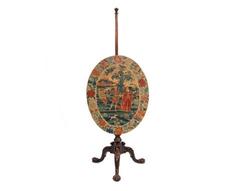 A Chippendale period mahogany pole screen, the large oval banner of gros and petit point needlework depicting three figures i