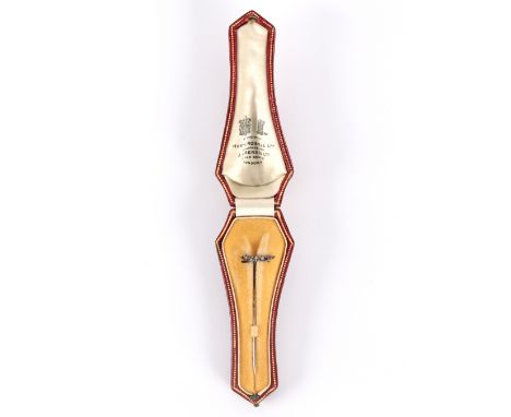 A diamond stick pin with fox terminal, the running fox with ruby eye, cased
