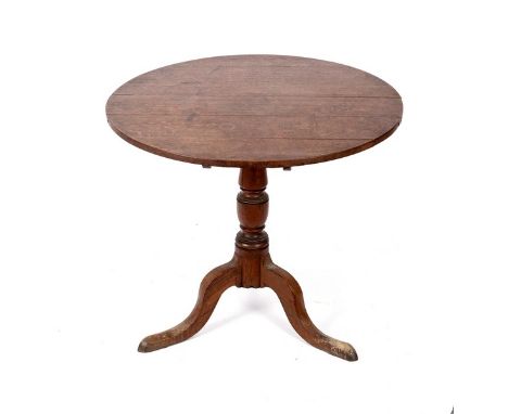 An early 19th Century circular table on a turned column and tripod support, 79cm diameter