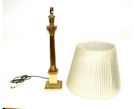 A brass Corinthian column lamp and shade, overall 94cm high CONDITION REPORT: This lamp is modern and in good condition