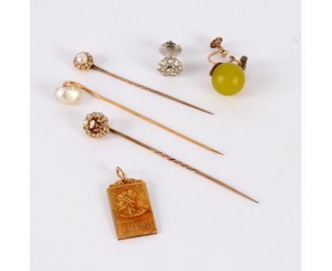 A diamond and pearl stick pin with cluster terminal, two further stick pins etc., in a leather jewel case, lacking key 