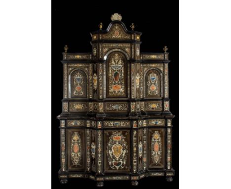 Gian Battista Gatti (Faneza 1819 - 1889).Ebonized wooden cabinet with&nbsp;hard stone and bone marquetry.244 x 173 x 52 cm.As