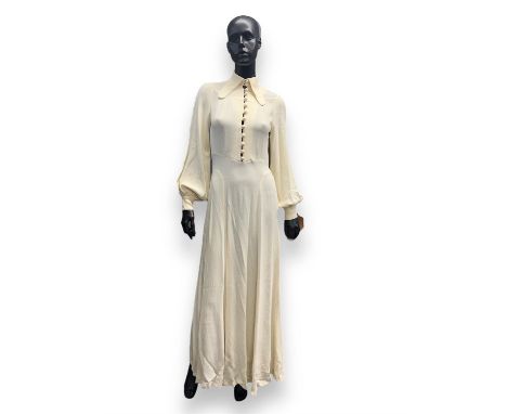 OSSIE CLARK (For Radley) Early 1970s cream Moss-crepe maxi-dress with tie back. Label states size 14 Fits UK12 (Pit to Pit 45