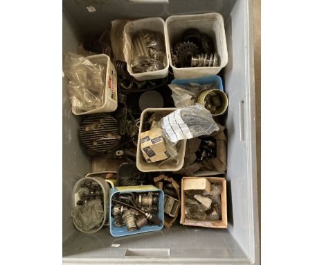 An autojumblers lotincluding various engine components; sprockets; camshafts; pushrods; rockers; gear levers; cush drive part