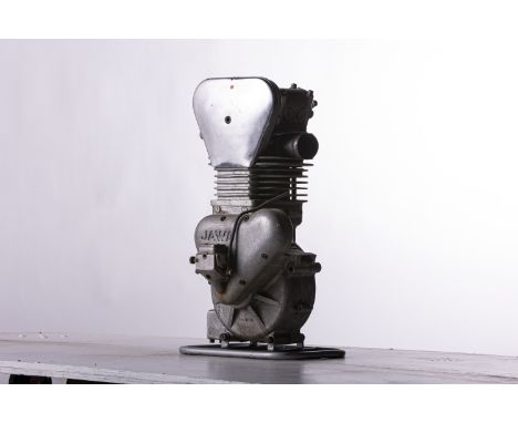 A JAWA DOHC enginenumbered 11899 with crankcase mating numbers 733/733, fitted with oil pump, completeness and condition unkn
