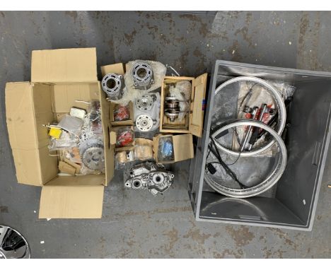 A selection of believed Honda Racing Sparesincluding a set of unnumbered single cylinder engine cases (possibly RS125); a cra
