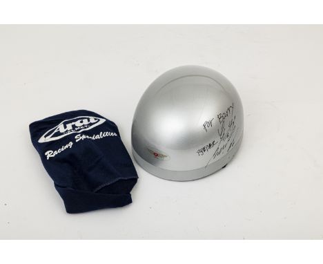 A Yamaha pudding basin helmetsigned 'For Barry' with multiple signatures and appearing in new condition, size unknown and acc