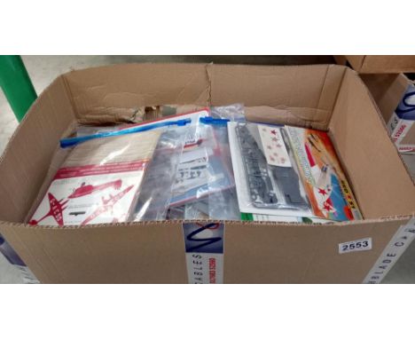 A box of model aircraft kits 