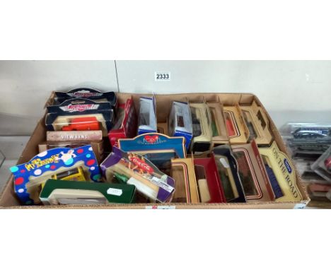 A large box of mixed Lledo model vans 