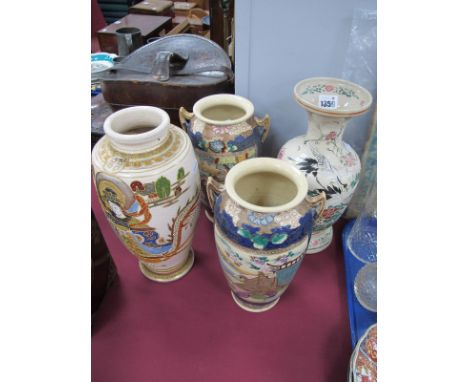 A Pair of Meiji Period Japanese Satsuma Vases, each featuring figures in garden, on blue ground 25cm high, two others, two ot