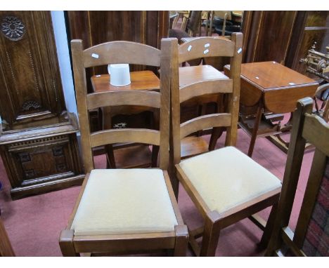 A Set of Four Hardwood Chairs, with ladder back rails drop in seats on square supports.