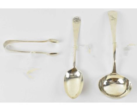A George III hallmarked silver soup ladle, London 1784, together with a George V hallmarked silver teaspoon, London 1912, and