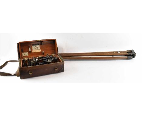 E. R. WATTS &amp; SONS; an early 20th century theodolite, in original wooden case and leather protective surrounding, on earl