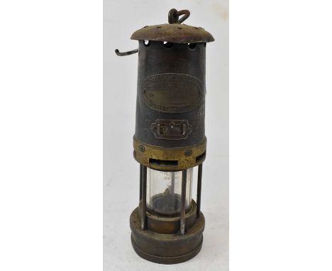 E. THOMAS &amp; WILLIAMS LTD; an early 20th century miner's lamp, height 26.5cm.