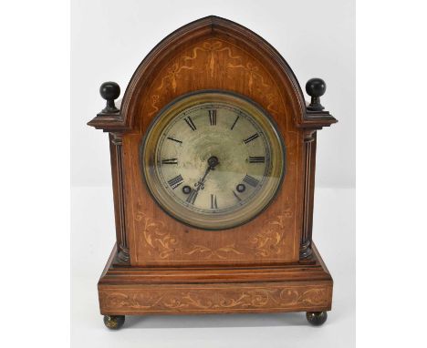 An Edwardian inlaid eight day mantel clock on gilt brass ball feet, height 33.5cm.Condition Report: One section of moulding i
