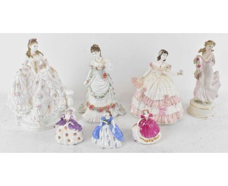 ROYAL DOULTON; a large porcelain figure of 'Cinderella' HN3991, height 25cm, a Coalport figure of a lady 'Olivia', a Royal Wo