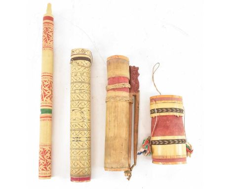 An tribal bamboo dart/arrow quiver, a tribal bamboo lidded pot, another bamboo lidded pot and a tribal bamboo woodwind instru