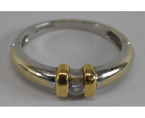 CHRISTOPHER WHARTON; an 18ct white and yellow gold single stone diamond ring, size N, approx 3.7g.