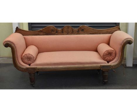 An early Victorian mahogany scroll arm sofa on turned reeded supports, width approx 200cm.