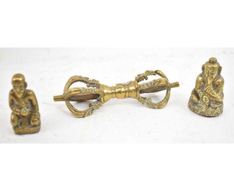 Two small Nepalese polished brass figures, height approx. 5cm, and a pierced bolt, length 12cm (3).
