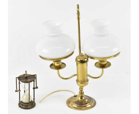 A brass double oil burner lamp converted to electricity and a brass sand timer (2). 