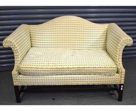 A reproduction Georgian style sofa, on square supports, width 135cm. Condition Report: No rips, tears or stains to the uphols