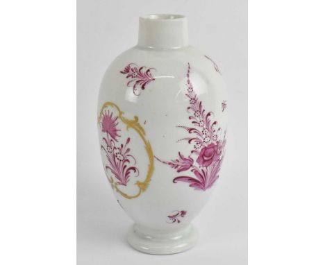 WORCESTER; a first period Worcester tea caddy painted with pink sprays of flowers within a gold cartouche in the Meissen styl