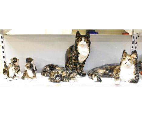WINSTANLEY; an early 20th century ceramic model of a seated cat, inscribed '42, Kensington' to base, and indistinctly signed,