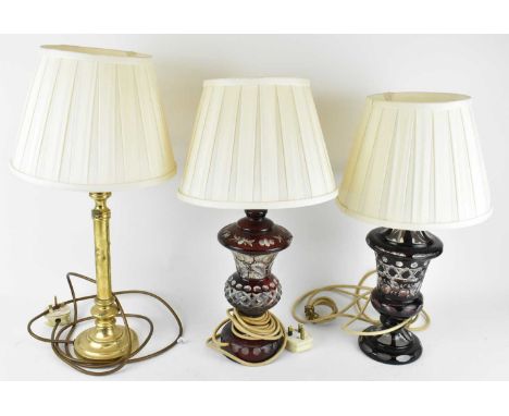 A 20th century Chinese Famille Rose porcelain table lamp, height to top of fitment 45cm, a 19th century cranberry glass table