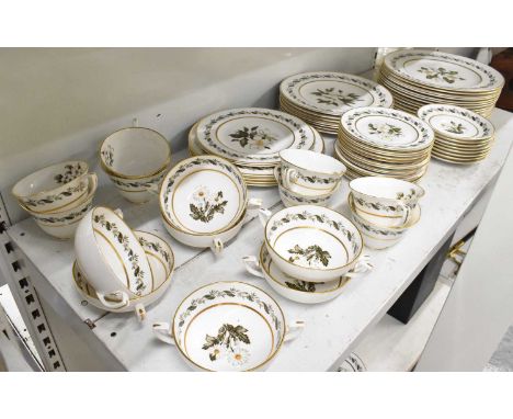 ROYAL WORCESTER; a part tea and dinner service decorated in the 'Bernina' pattern, comprising seven loving cups, eight teacup