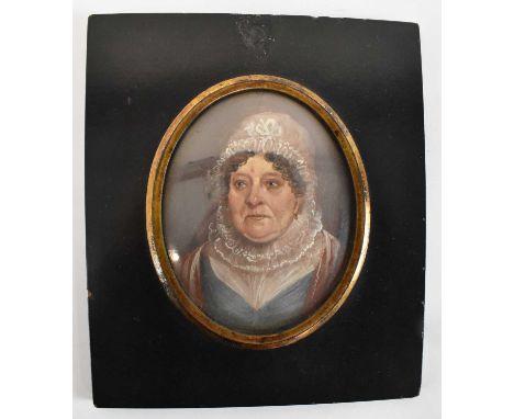 A Victorian oval portrait miniature painted on card, study of a female, 9 x 7cm, in ebonised frame.