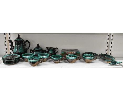 VALLAURIS; a part tea service comprising teapot, lidded sugar bowl, milk jug, six teacups, six saucers, cheese dish, fish sha